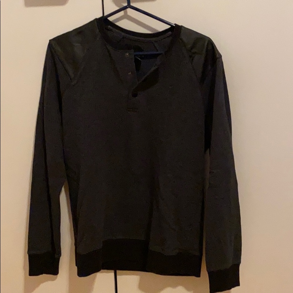 Black sweater with black faux leather shoulders